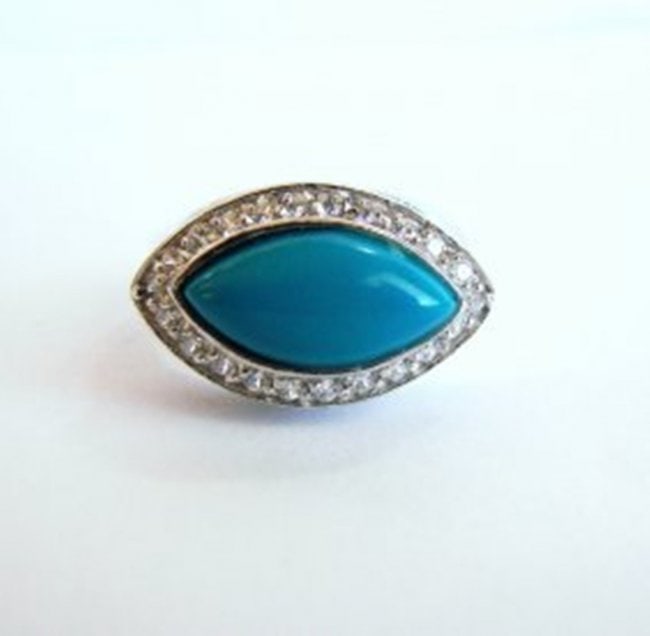 Creation Diamond Turquoise Ring 4.60Ct 18k W/g Overlay: Gem Type: Creation Diamond Cabochon Turquoise Item: Ring Ring face diameter: 19.5x12mm 70 Pieces: 1.75 carat Round Brilliant Clarity: VS, Color: F Turquoise: 2.85 carat Cabochon Marquise shape Clarity