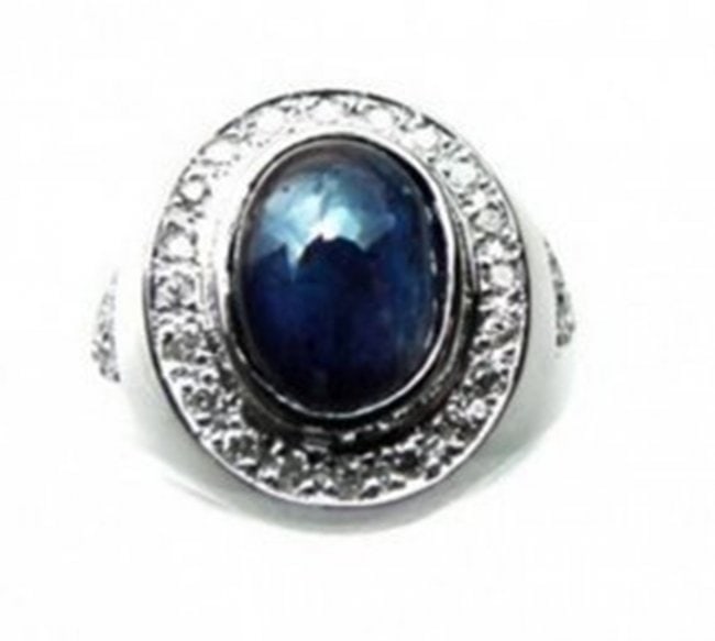 Man's Sapphire, Diamond Ring 4.75Ct 14k W/g: Gem Type: Natural Blue Sapphire and Diamond Item: Man Ring (Size: 9) Diamond: .52 Carat Round Brilliant (Clarity: SI-1, Color: H) Sapphire: 4.23 Carat Oval Cabochon Clarity: Transparent, Color: Blue, 