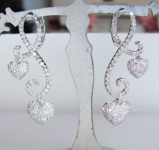 Double Heart Diamond Earring 1.42Ct 18K W/G: Gem Type: Natural Diamonds Item:Earrings Diamonds 170 Pieces Weight: 1.42 carat Round brilliant Clarity: SI1,Color: H-I, Treatment: None Metal: 18k white gold weight :5.05 grams, Length: 1.3/4"L Clips