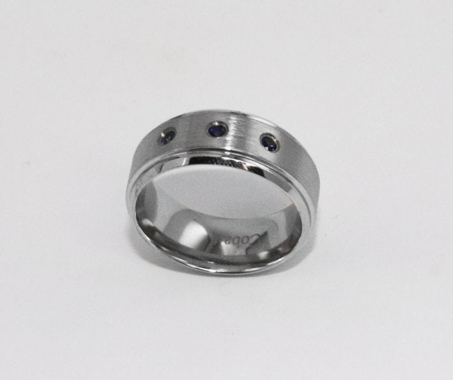 Man'S Cobalt Eternity Band with Blue Sapphire: Item: Eternity Band Brushed Finish Shiny Stepped Edge 3 Bule Sapphire Size: 2.1mm 2.3mm each. approx. Setting: Bezel-Set Width: 9mm, Size: 9, Item: New