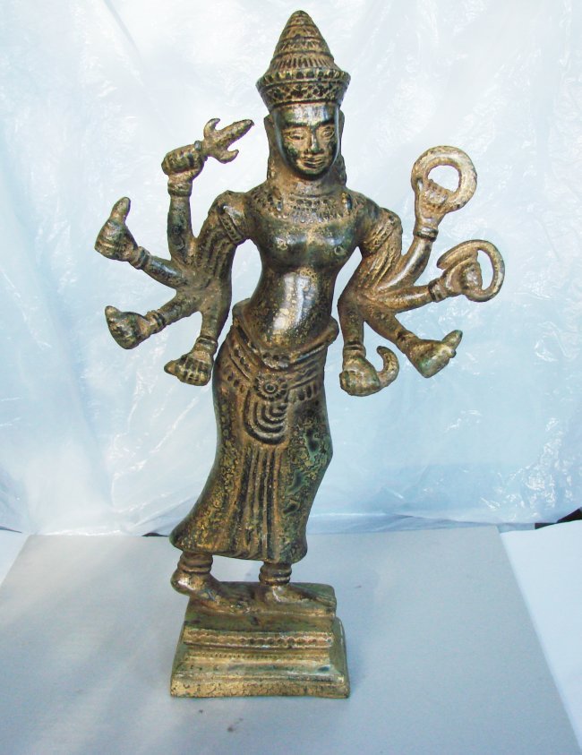 Khmer, Bronze Hevajra mandala Buddhist 12th Century: Khmer, Bronze Hevajra mandala Buddhist 12th Century Collection item Material: Solid Bronze Hight: 10” ,Width: 6” Color: Gold and Brown Texture Weight: 1.5 Pound,Statue: 8 Arms Estimated High Price