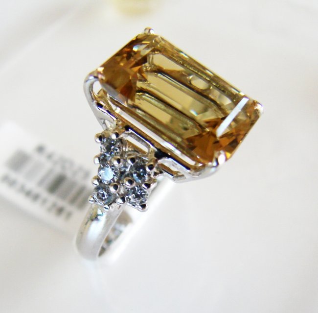 Lemon Topaz Creation Dia Ring 7.15Ct 18k W/g Overlay: Gem Type: Natural Lemon Topaz/Creation Diamond Item: Ring Lemon Topaz Weight:6.35 Carat Octagon Facet Measurement: 10x8x6.5mm Clarity: VVS1, Color: Golden, Treatment: reradiated Hardness 7,Origin, Bra
