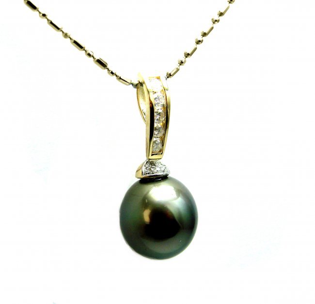 Tahitian Pearl Pendant 10 mm & Dia:. 25 CT14k Y/G: Gem Type: Natural Tahitian pearl and Diamond Quantity: 1 Diamond: .25 carat round Clarity: VIS-Color: Color: F-Treatment:None Tahitian pearl: 10mm Grade: AA-Color: Black/Mixed Luster: very nice, Shape