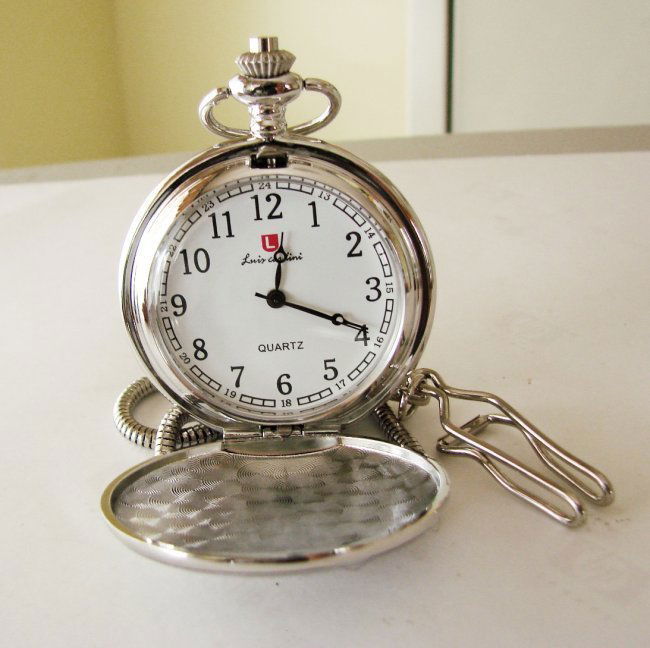 Pocket Watch Quartz Stainless 14" Chain 18k W/g Overlay: Pocket Watch Luis Cardini Quartz Japan Movement,18k White Gold Overlay Design: Booth Side Smooth Size:1.3/4 x 1.3/4 mm Come With Chain 14.5"-Run By Battery Estimated Value Price: $350 Good For The Gif