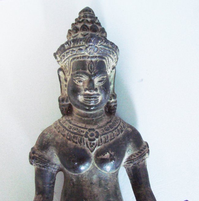Khmer, Bronze Naga King Statue 12th Century: Khmer, Bronze Naga King Statue 12th Century Collection item Color: Gold and Brown Texture Material: Solid Bronze Height: 10.5â€ x Width: 3â€ Weight: 1 Pounds Estimated High Price: $2,400
