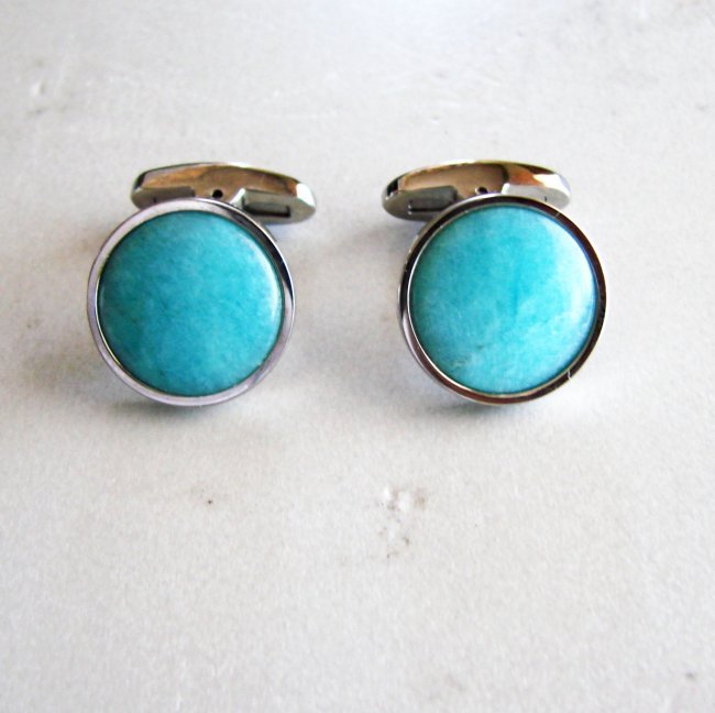 Men Cufflink Stainless Natural Amazonite Round 10.96Ct: Gems Type: Natural Amazonite Cabochon Measurement: 15 mm Weight:10.96 Carat Clarity: Opaque,Color: Blue-Green Treatment: None Cufflink Size: L 1" x W 3/4" inch Shape: Round Metal: Stainless Steel <b
