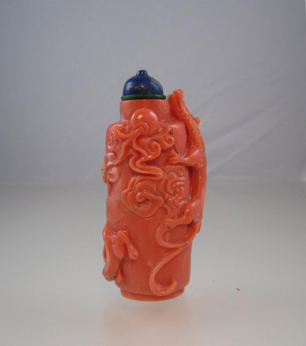 A Chinese Carved Red Coral Snuff Bottle (1 of 10)