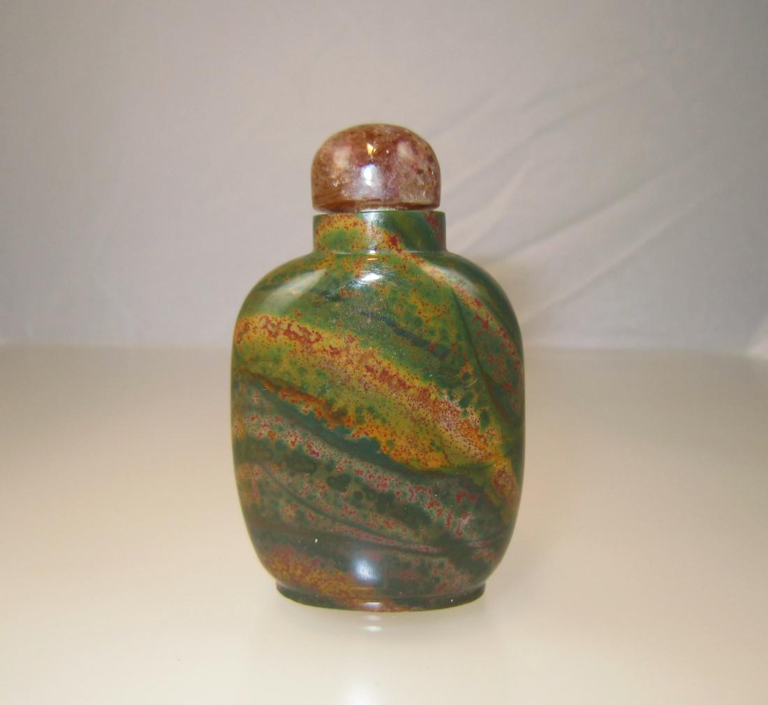 A Banded Puddingstone or Green Hardstone Snuff Bottle (1 of 5)