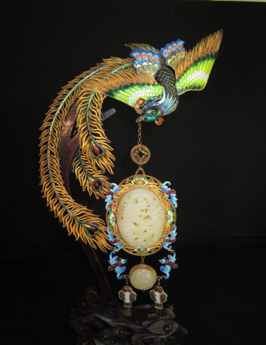 A Chinese Gilt and Enamel Silver Phoenix with Jade: A Fabulous Large Chinese Gilt and Enamel and Silver Flying Phoenix with Jade Panels insert, and coral, carnelian, and turquoise inlaid, on custom made wood frame, stamped Silver. A fabulous and unique