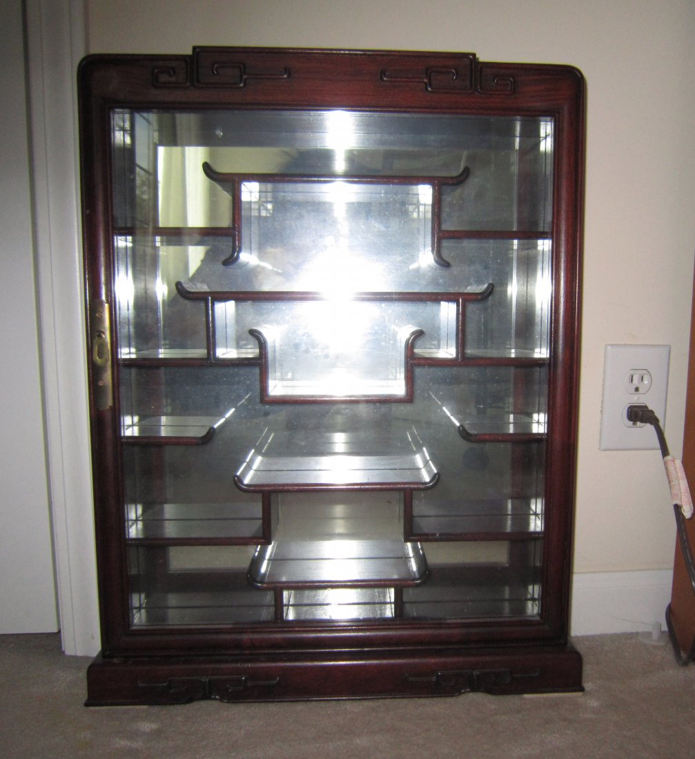 Small Chinese Rosewood Wall Display Cabinet: A Small Chinese Hardwood Wall Display Cabinet possible Rosewood, working good for your snuff bottle collection, 20th Century. H24" x W18" (62cm x 45cm). Good condition