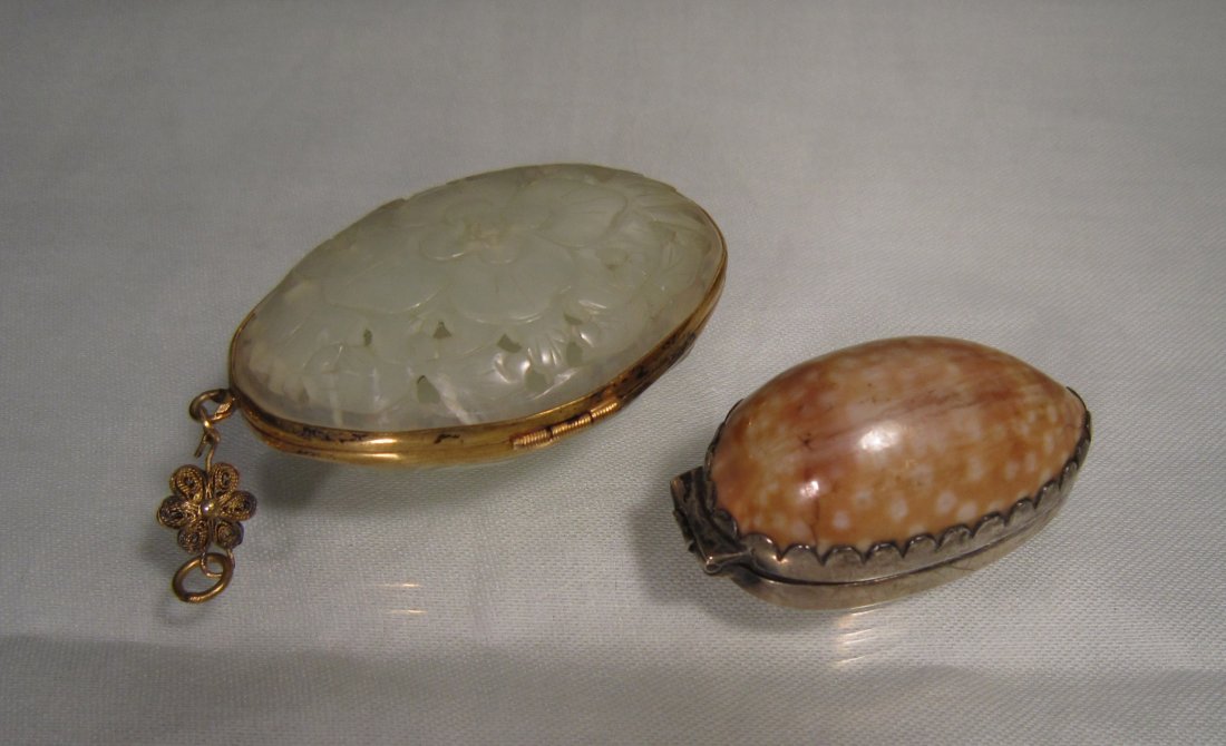 A Chinese Hardstone Pouch and A Shell Snuff Box: Pouch carved from jade like hardstone with gilt silver hinges, the shell snuff box in silver mount; larger 2 in. (5 cm) long