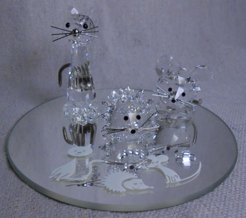 SWAROVSKI CRYSTAL MOUSE CAT HEDGEHOG: Swarovski silver crystal edition, collectors society, mouse, cat and hedgehog with display stand and with box and certificate.