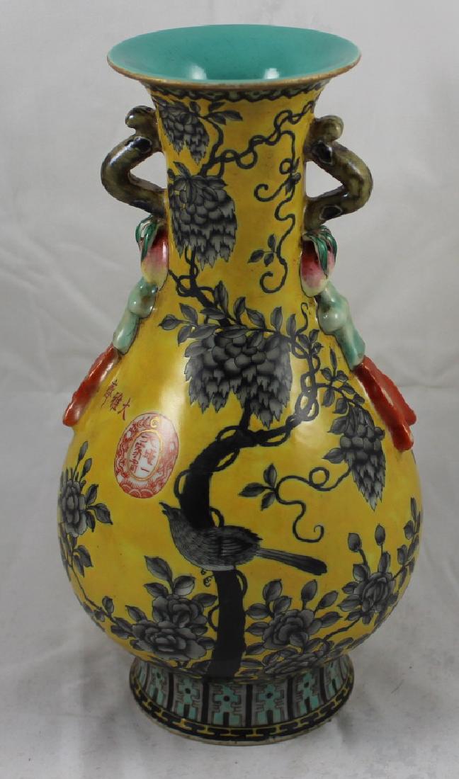 A CHINESE PORCELAIN FAMILLE JAUNE VASE (1 of 4)