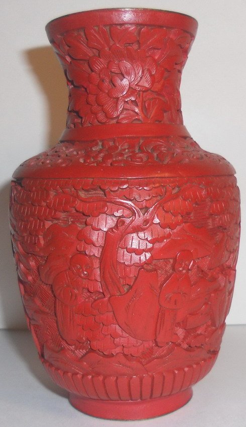 A Chinese cinnabar vase.: A Chinese cinnabar vase, marked 'CHINA'. H: 13cm (5.25") Shipping within Canada & continental U.S.A. $25. Shipping to China $40. All other countries, please Email for shipping rates. Combined shipping