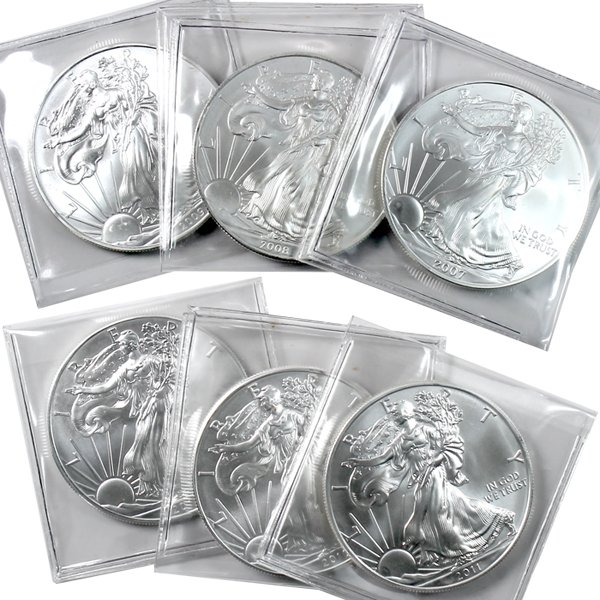 2007-2012 BU Silver American Eagle - 6-Coin Set: 6-Coin Set from 2007 to 2012 Silver American Eagle Bullion Coins by The United States Mint. The Silver Eagle Coin Has a Legal Tender Value of $1 and Contains 1 Oz of .999 Fine Silver. Comes in Brillia