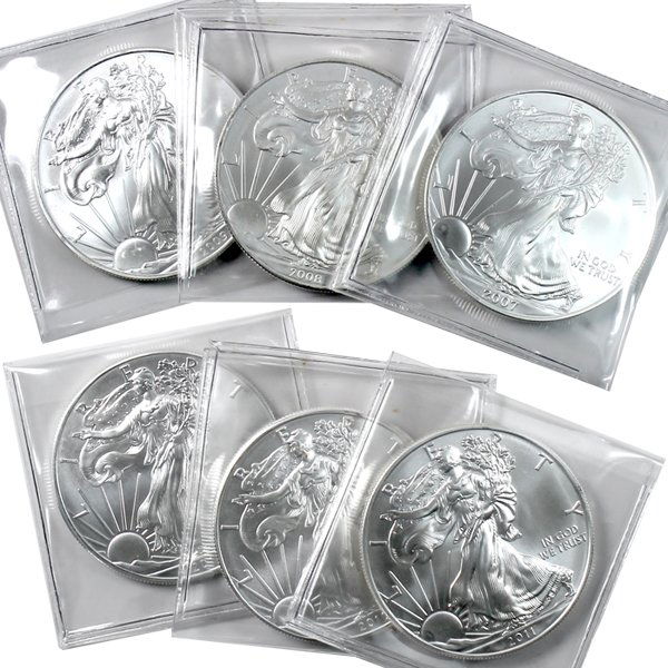 2007-2012 BU Silver American Eagle - 6-Coin Set: 6-Coin Set from 2007 to 2012 Silver American Eagle Bullion Coins by The United States Mint. The Silver Eagle Coin Has a Legal Tender Value of $1 and Contains 1 Oz of .999 Fine Silver. Comes in Brillia