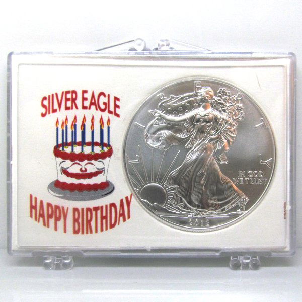 BU Silver Eagle - Happy Birthday Cake Snap Lock: 1 Oz Silver American Eagle Happy Birthday Cake Snap Lock Display Case. The Silver Eagle Coin Has a Legal Tender Value of $1 and Contains 1 Oz of .999 Fine Silver. Dates are Based on in Stock Inventory