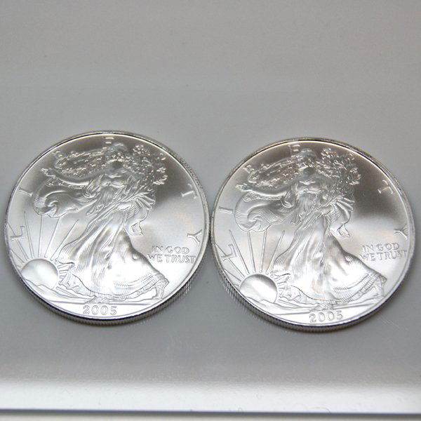 2-Coin Set American Silver Eagles - Unc: Silver American Eagle (2-Coin Set) by The United States Mint. Each Silver Eagle Coin Has a Legal Tender Value of $1 and Contains 1 Oz of .999 Fine Silver. Comes in Brilliant Uncirculated Condition. Da
