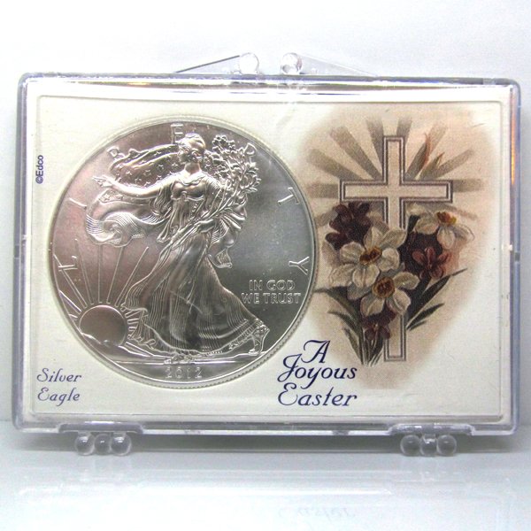 BU Silver Eagle - Easter Cross Snap Lock: 1 Oz Silver American Eagle Easter Cross Snap Lock Display Case. The Silver Eagle Coin Has a Legal Tender Value of $1 and Contains 1 Oz of .999 Fine Silver. Dates are Based on in Stock Inventory and ar