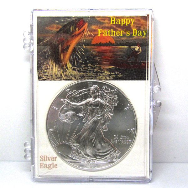 BU Silver Eagle - Father's Day Fishing Scene: 1 Oz Silver American Eagle Happy Father's Day Fishing Scene Snap Lock Display Case. The Silver Eagle Coin Has a Legal Tender Value of $1 and Contains 1 Oz of .999 Fine Silver. Dates are Based on in St
