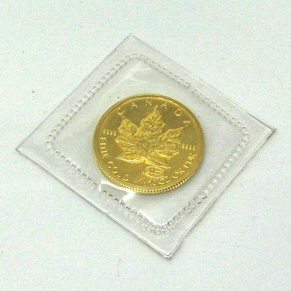 1/10 Oz BU 24k Gold Canadian Maple Leaf - Random Date!: Gold Maple Leaf Bullion Coin by The Royal Canadian Mint. The Gold Maple Leaf Coin Has a Legal Tender Value of $5 Canadian Dollars and Contains 1/10 Oz of 24-Karat (.9999 Pure) Gold. Comes in Brilliant