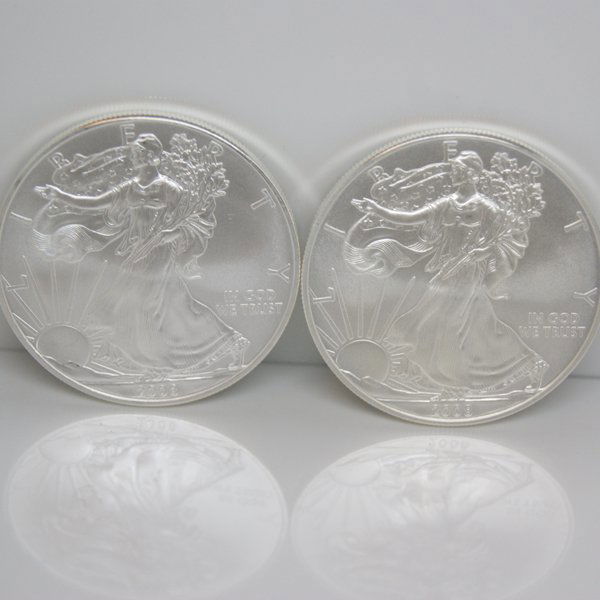 2-Coin Set American Silver Eagles - Unc: Silver American Eagle (2-Coin Set) by The United States Mint. Each Silver Eagle Coin Has a Legal Tender Value of $1 and Contains 1 Oz of .999 Fine Silver. Comes in Brilliant Uncirculated Condition. Da