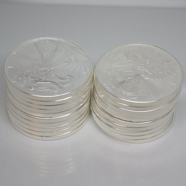 (10) Silver American Eagles - Brilliant Uncirculated: Silver American Eagle (10-Coin Set) by The United States Mint. Each Silver Eagle Coin Has a Legal Tender Value of $1 and Contains 1 Oz of .999 Fine Silver. Comes in Brilliant Uncirculated Condition. D
