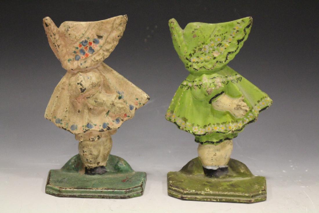 Cast Iron Sunbonnet Baby Doorstops / Bookends: Cast iron Sunbonnet Baby doorstops / door stops or bookends, 6" H.
