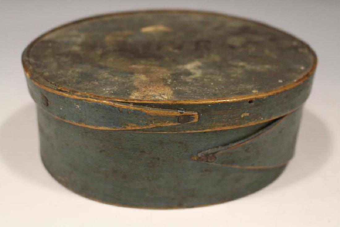 Green Painted Oval Pantry Box 5" W: 19th C. green painted oval pantry box, single finger laps, Anna etched on underside, paint wear to lid. 6" W. One of 30 pantry boxes in this sale - some selling in multiples.
