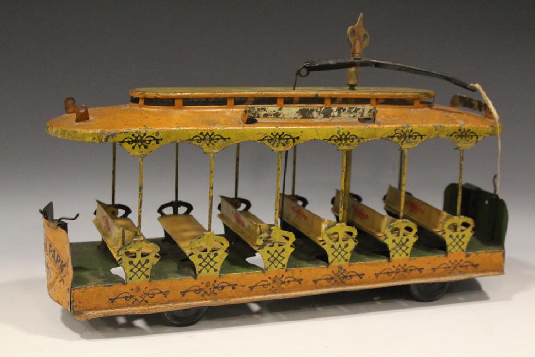 Converse Pressed Steel Clockwork Trolley Car: Converse pressed steel clockwork / keywind trolley car, marquee and fronts are marked "City Hall Park 175" clockwork trolley car,15 1/2'' L. Lacking two marquees.