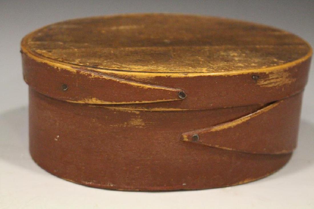 Small Red Stained Pantry Box - Single Finger Laps: Small size oval pantry box, original red stain, single finger laps on lid and base, 6 1/2" L x 4 3/4" D x 2 1/2" H.