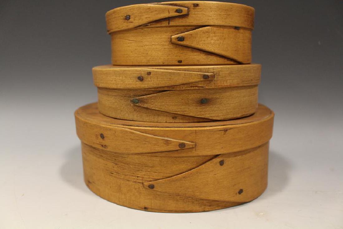 Lot of 3 Small Oval Pantry Boxes - Single Finger Laps: Lot of 3 small, graduated sizes, oval pantry boxes, each with single finger laps - smallest 4 3/4" W; 5 1/4" W; 6 3/4" W.