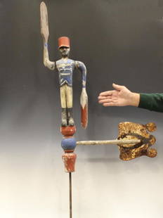 19th C. Folk Art Whirligig Hessian Soldier 30" H +: 19th to early 20th C. folk art whirligig bearded Hessian soldier, red, white & blue painted wooden figure with tin weather vane banner, hand-carved, mounted (removeable) from heavy wooden and iron sta
