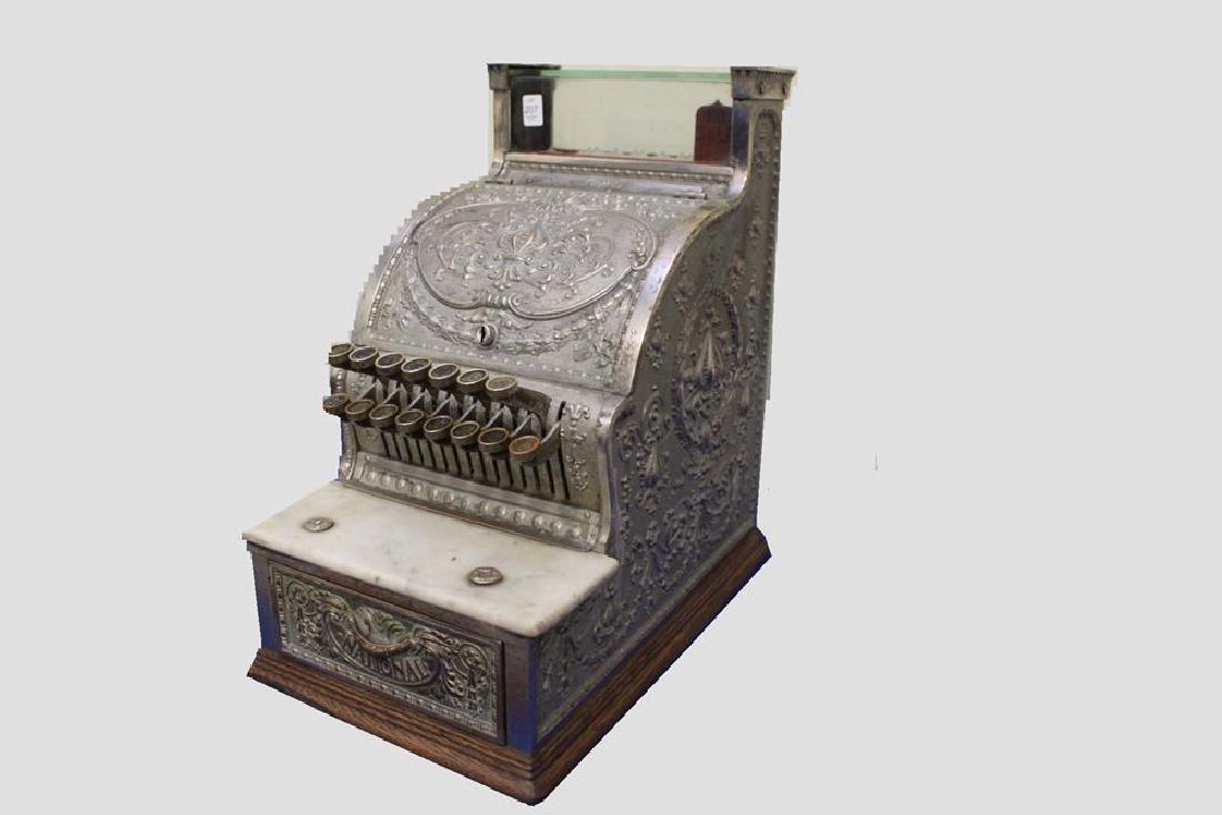 Candy Store Model 50 NCR Cash Register: Turn of the 20th century National Cash register model 50, barber shop / candy store, nickel-plated, Serial #S92271. 21 1/2" H x 10 1/4" W x 16" D, good working condition, lacking marquee and door keys
