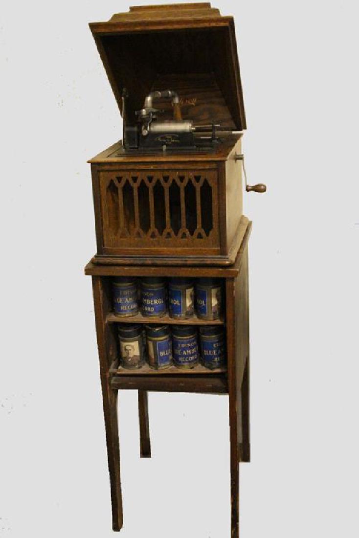 Edison Amberola VIII Cylinder Player & Storage Cabinet: Edison Amberola VIII cylinder oak record player with "4563" on brass plate, last patent date of May 31, 1898, grain-painted metal pieces - grates, horn and covers, original finish in excellent conditi