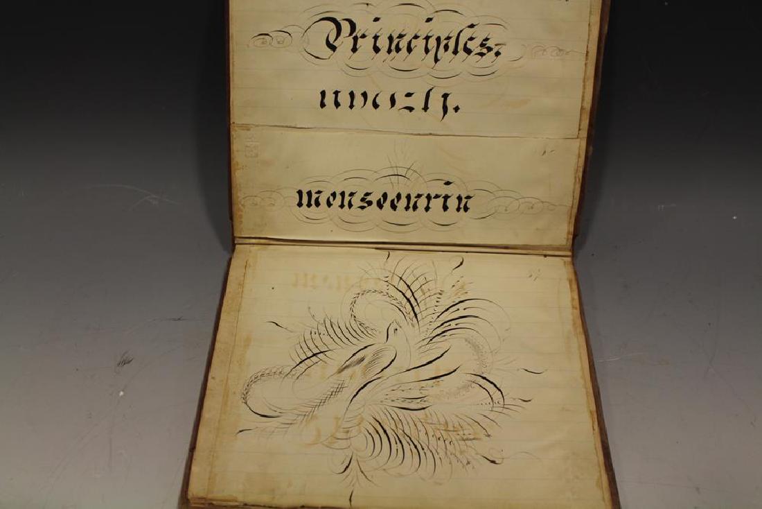 Small Scrapbook of Hand Done Calligraphy Samples: Small 6 x 8" scrapbook of calligraphy samples and few bird drawings. Photos show the pages with samples, very few other pages are blank.