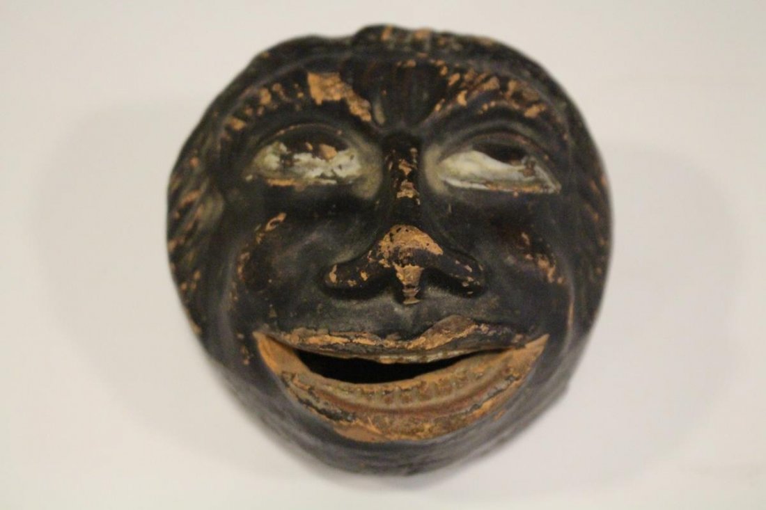 Rare Black Americana Redware Head Bank: Rare 1840-50s molded and painted redware head bank of Black Americana man, 4" x 4", 3 flakes to mouth area and scattered minor paint wear.