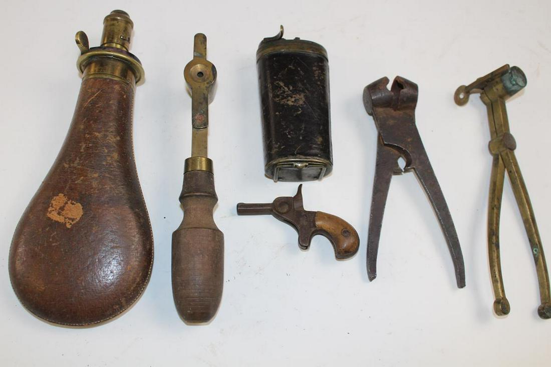 Powder Flask, Bullet & Ammo Related Articles: 19th C Ammo related articles - James Dixon black powder flask; leather wrapped bullet shot flask, 4 1/4" H, look at close-up photos of this carefully, there are contents in each opening; round bullet 