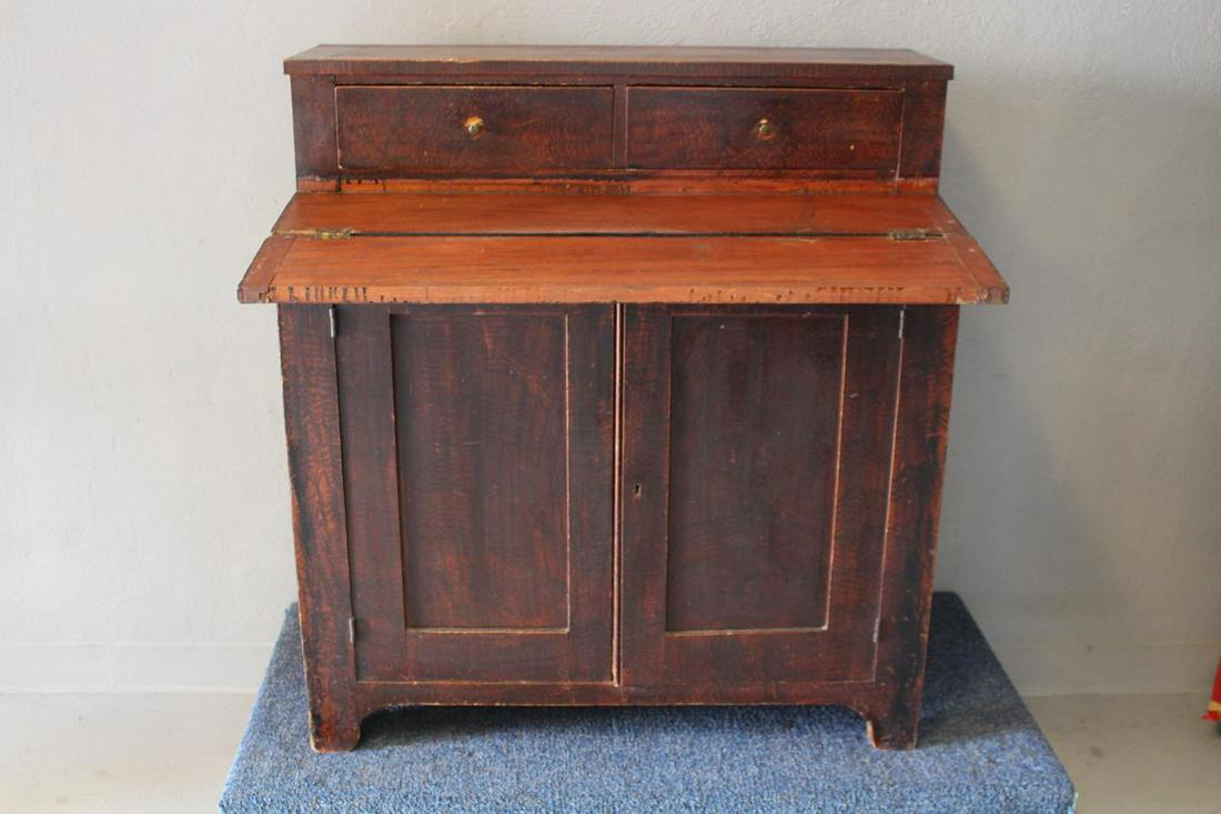 19th C Grain-Painted Cupboard Desk: 19th century grain-painted desk cupboard, top shelf flips open to desk writing surface, 2 drawers over double blind door case, 39" H x 36" W x 19" D. Blanket wrap / bubble wrap, door to door, shipping