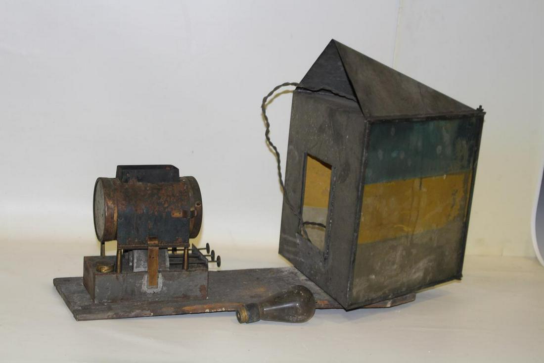 Home-Made Slide Projector Magic Lantern: 19th C bench-made / homemade / folk art slide projector magic lantern, insert 5 x 6" slides into slot, projector is fuel operated, old light bulb and electric cord in metal housing. Mounts on 31" long