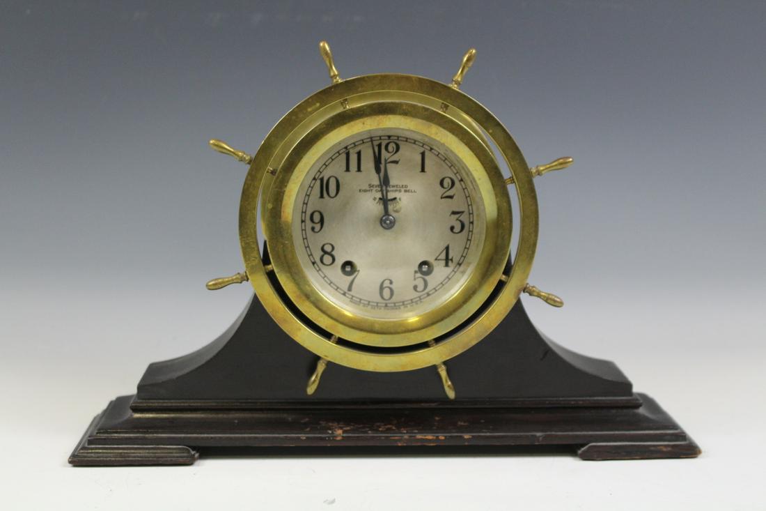1940s Seth Thomas Ship's Bell Mantel Clock: 1940s Seth Thomas ship's Bell mantel clock, Thomaston, brass clock mounted in mahogany case, 7-jewel, 8-day, with ship's-bell strike movement, 13 3/4" L x 9 1/4"H x 3 1/2' D. Working condition.