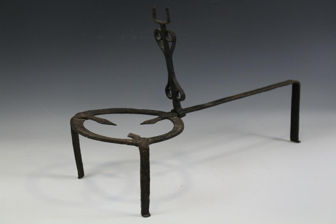 Large Forged Iron Hearth Cooking Trivet: 19th century forged iron hearth cooking trivet with adjustable utensil holder, 26" L x 15" H.