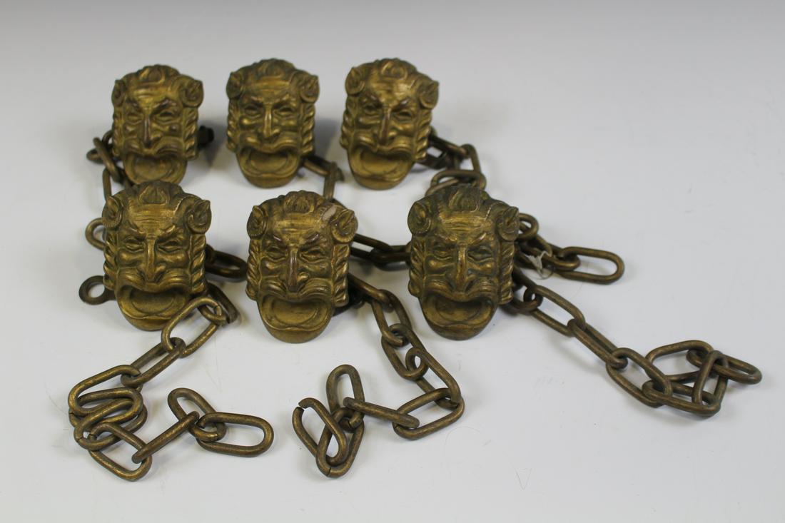 Bronze Mythological Faun Masks Curtain Tiebacks: Matched set of 6 bronze curtain tie backs / tiebacks (?) with figural masks of Faun, a half humanâ€“half goat creature in Greek mythology, each is 15" long including chain and mask.