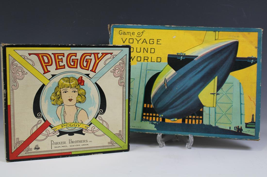 Hard to Find Board Games - 1923 & 1926: Lot of two first quarter 20th century games with all original pieces and boards - Voyage Round the World, circa 1926, Milton Bradley game with Zeppelin image on lid, folding game board with 4 stained 