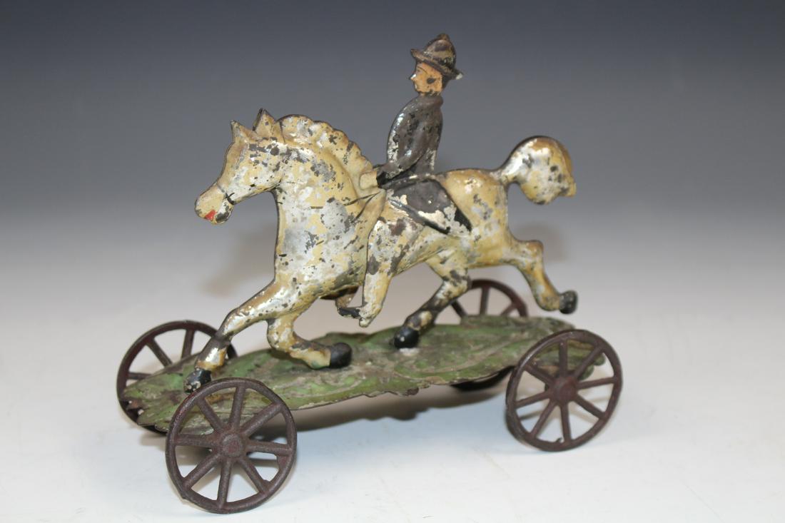 19th C Tin Penny Toy Rider on Horseback Pull Toy (1 of 2)