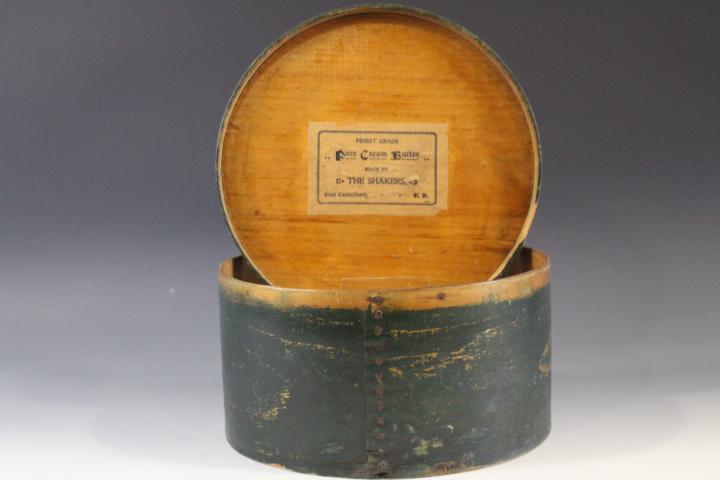 Labeled Shaker Green-Painted Round Pantry Box: Labeled Shaker Dark Green-Painted Round Pantry Box - interior with paper label "Finest Grade Pure Cream Butter Made by the Shakers East Canterbury NH". Paint wear.