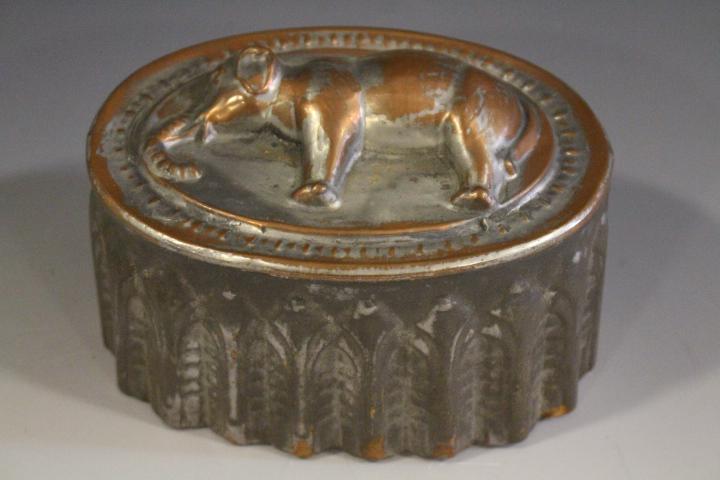 Antique Copper & Tin Food Mold - Elephant: Antique copper and tin food mold - very detailed elephant, 6 1/4" L x 5" W x 3 3/4" H, wear and light oxidization. SEE SEVERAL OTHER RARE COPPER FOOD MOLDS LATER IN THIS SALE.