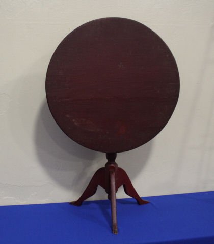 Mid-19th C Red Painted Tilt-Top Tea Table: Early to Mid-19th Century Country Red-Painted Tilt-top Tea Table with Birdcage Mechanism - bench made, 27 1/2" W. Age old crack to table top, chipped toe to one leg. THIS LOT REQUIRES A THIRD PARTY PA