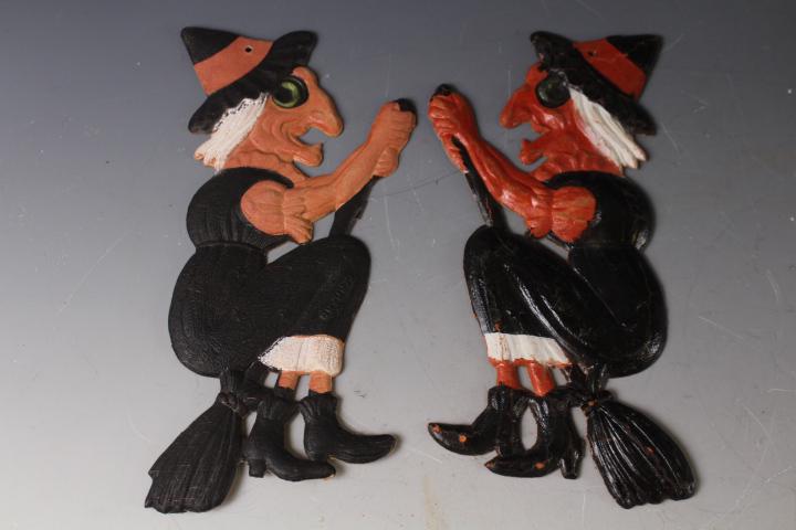 2 Halloween Left & Right Witch Die Cuts - Germany: 1920-30s Lot of 2 Halloween Die Cut Pressed Board Decorations, always hand-painted by artists - witches riding broomsticks - 1) facing left, 2) facing right.7 1/2" H, both ink stamped and impressed Ge