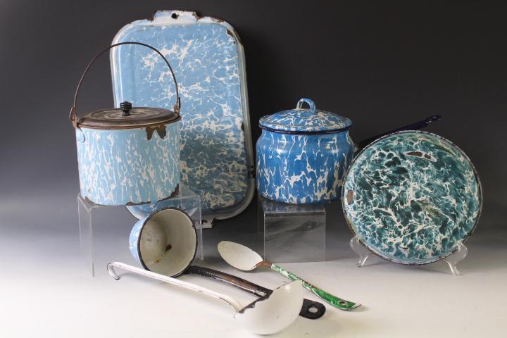 Group of Graniteware Kitchenware: Group of Graniteware Kitchenware pie plate, lidded pot, lidded berry pail, stirring spoon, ladle, (also white ladle), loaf pan.